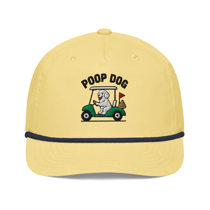 Front of Yellow/Navy hat with image of a poodle riding a golf cart with the words Poop Dog above
